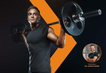 Integratori per la palestra: cosa funziona davvero? sportivo con bilanciere